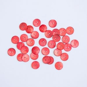 Hand Dyed Shell buttons by the Woven in Coral (warm red)