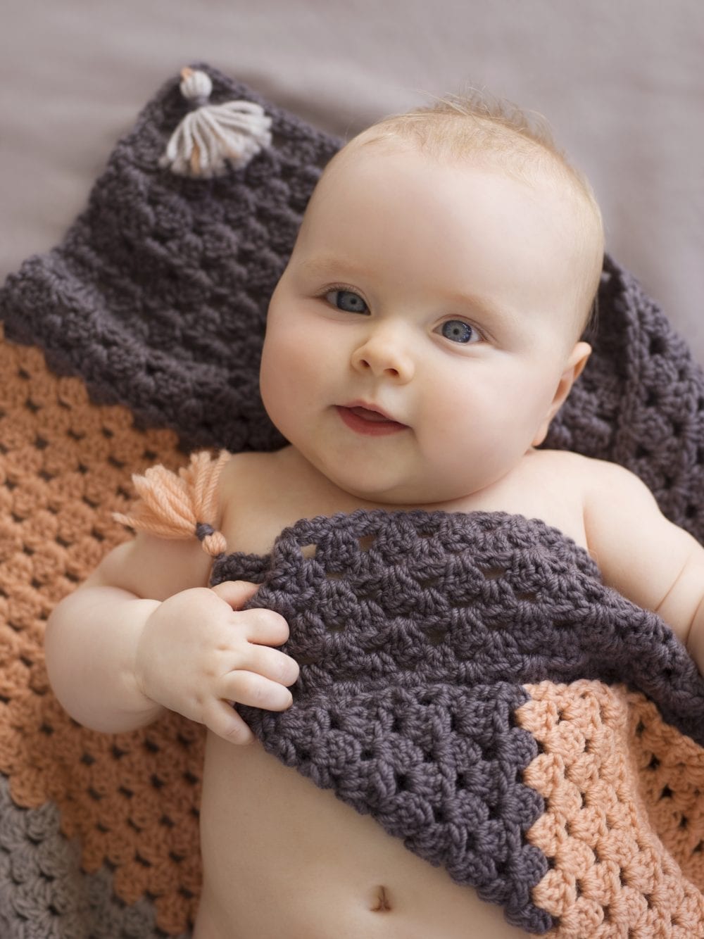 Simple Baby Crochet Blanket by The Woven Co
